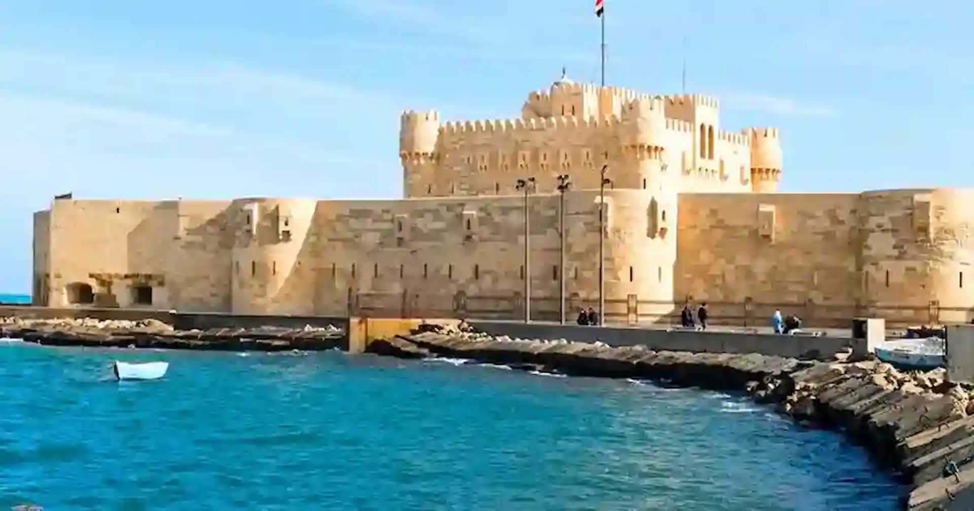 The waterfront Corniche of Alexandria at dusk with the Mediterranean Sea